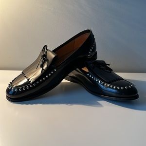 Like New! Premium leather slip on shoes with metal studs.